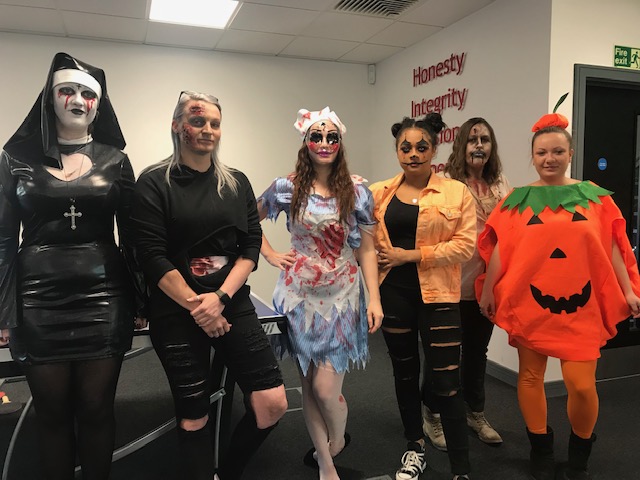 Staff dressed in Halloween costumes