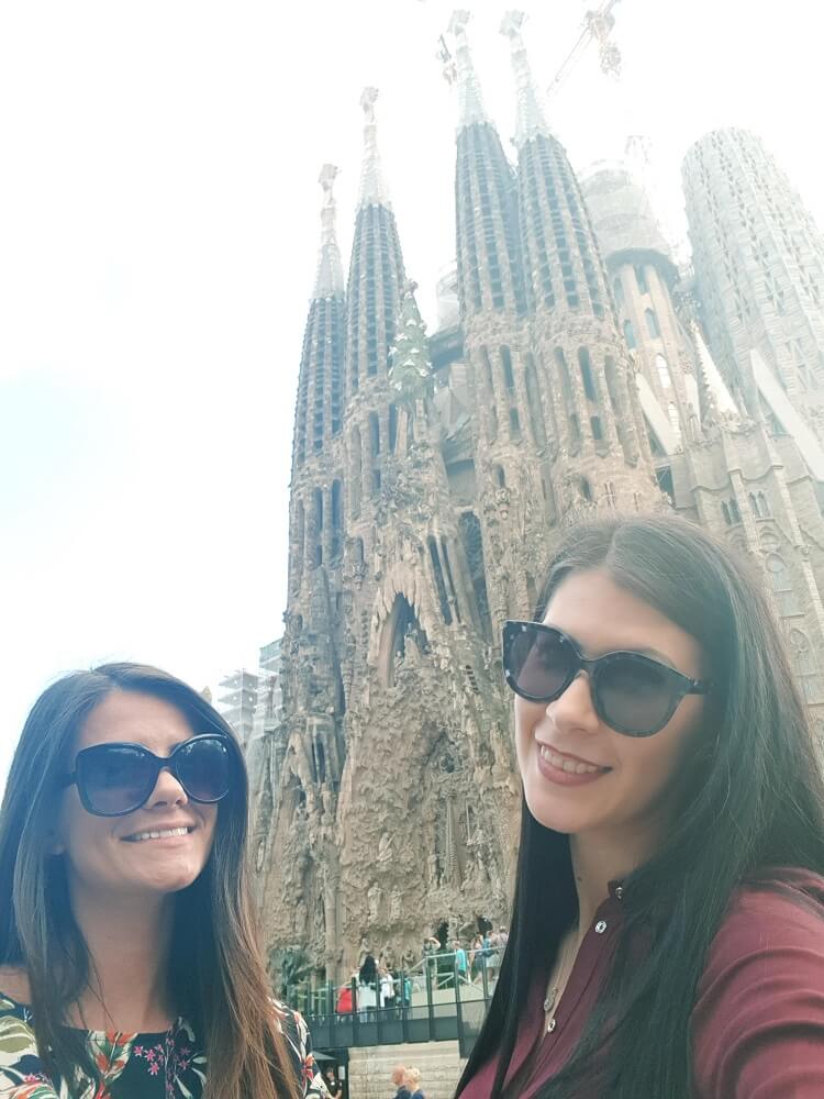 2 women outside a building