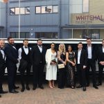 Whitehall staff outside of a limousine