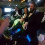 Whitehall staff inside of a limousine